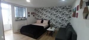 Ένα ή περισσότερα κρεβάτια σε δωμάτιο στο Studio confortable à Noyers-sur-Cher - 30 m² - Parking