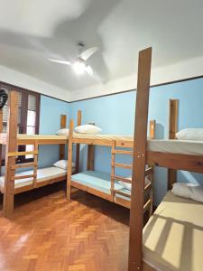 a dorm room with four bunk beds in it at Rio Stay- Copacabana in Rio de Janeiro