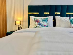 Ένα ή περισσότερα κρεβάτια σε δωμάτιο στο Oasis Studio - Parking, Fiber, Near the Station