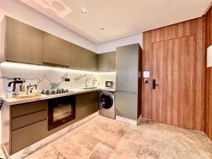 Η κουζίνα ή μικρή κουζίνα στο Oasis Studio - Parking, Fiber, Near the Station