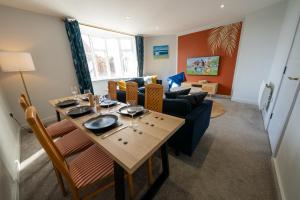 Posezení v ubytování The Sprinkle Pad 3BR Luxury Family Retreat + 23 fotografií