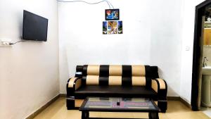 TV a/nebo společenská místnost v ubytování Patron Stay