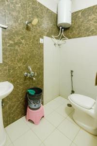 Koupelna v ubytování Patron Stay + 6 fotografií