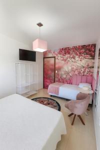 Postel nebo postele na pokoji v ubytování LSViver Hospedagem