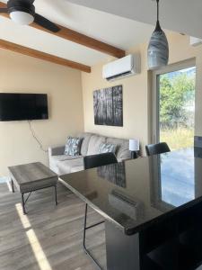 a living room with a couch and a table at One Night with the Stars in Arroyo Seco