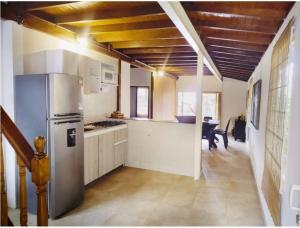 Kuchyň nebo kuchyňský kout v ubytování Tu paraíso frente al mar te espera en Santa Verónica + 13 fotografií