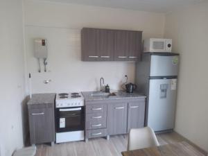 ครัวหรือมุมครัวของ Cabaña Desierto +2 ภาพ