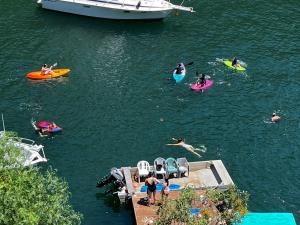a group of people on surfboards in the water at Dreamtime Bay  +19 photos