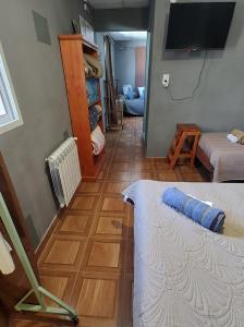 Et tv og/eller underholdning på Raíces Hospedaje