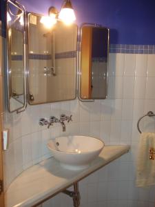 Koupelna v ubytování Apartamento Aguas del Sella + 25 fotografií