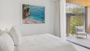 Ένα ή περισσότερα κρεβάτια σε δωμάτιο στο Villa Verda 2 - Luxury Living, Yamba Style +11 φωτογραφίες