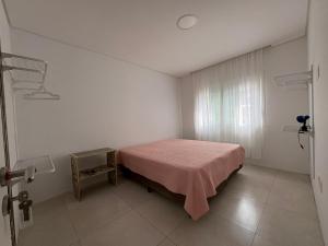 Ένα ή περισσότερα κρεβάτια σε δωμάτιο στο Hostel Beija-Flôr