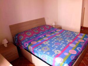 Postel nebo postele na pokoji v ubytování Casa Natale