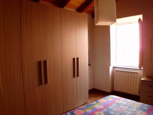Postel nebo postele na pokoji v ubytování Casa Natale