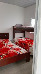 Ένα ή περισσότερα κρεβάτια σε δωμάτιο στο Finca la Cumbre