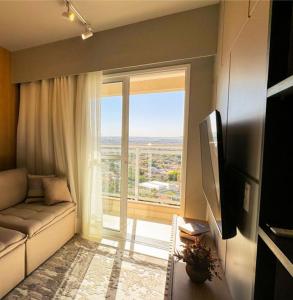 Μια τηλεόραση ή/και κέντρο ψυχαγωγίας στο O mais novo e aconchegante da cidade