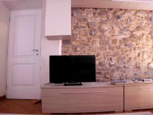 TV a/nebo společenská místnost v ubytování Casa Natale