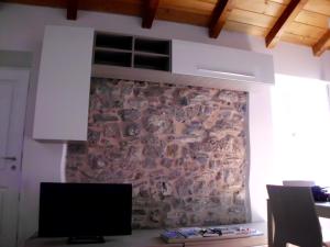 TV a/nebo společenská místnost v ubytování Casa Natale