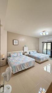 Cama ou camas em um quarto em Dou Dou Long Homestay mais 55 fotos