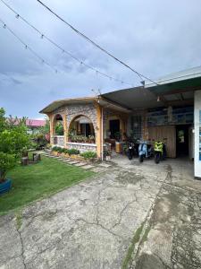 a building with two motorcycles parked outside of it at Subangan bayud3, Burgos central location in Burgos +21 photos