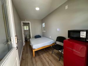 Ένα ή περισσότερα κρεβάτια σε δωμάτιο στο Private En-suite