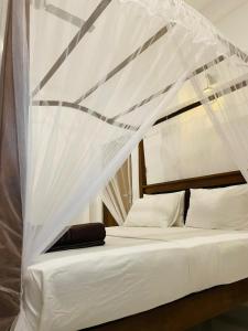 Postel nebo postele na pokoji v ubytování No 36 Mirissa + 75 fotografií