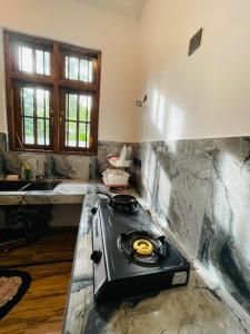 Kuchyň nebo kuchyňský kout v ubytování No 36 Mirissa