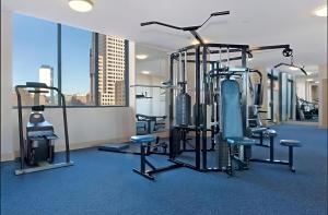 a gym with cardio equipment in a building at 92AH Abnb-Style Central Sydney 1BR, Free Parking, Prime Location in Sydney
