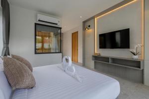 Μια τηλεόραση ή/και κέντρο ψυχαγωγίας στο Kiang Tawan Villa 2