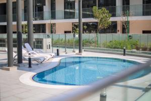 Πισίνα στο ή κοντά στο Masdar Modern Studio