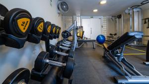 a gym with lots of equipment in a room at Casa Andina Standard Trujillo Plaza in Trujillo