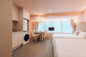 Televisyen dan/atau pusat hiburan di Monthliv Jongno Jonggak Station Hotel Stay