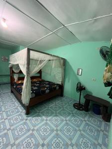 Ένα ή περισσότερα κρεβάτια σε δωμάτιο στο Sumatera Happy Track Tour Guest House +15 φωτογραφίες