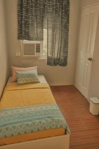 Кровать или кровати в номере Islana Stay Rm B for 1pax only