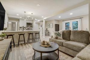 a living room with a couch and a table at 4925 Pike Unit2 in Cascade-Chipita Park