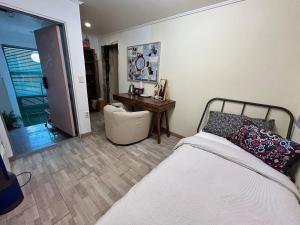 Postel nebo postele na pokoji v ubytování gam rooftop