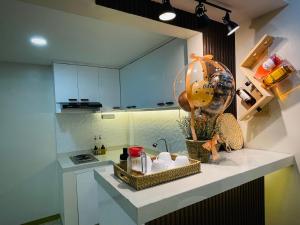 Η κουζίνα ή μικρή κουζίνα στο Reilys Crib - Cozy Home Stay +8 φωτογραφίες