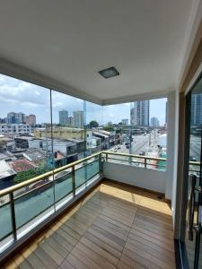 a balcony with a view of a city at Cobertura COP30 in Belém