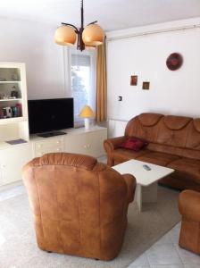 Posezení v ubytování Sirály Apartman