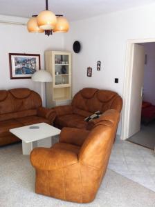 Posezení v ubytování Sirály Apartman