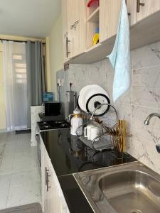 a kitchen with a sink and a counter top at Kamakis spaces in Ruiru