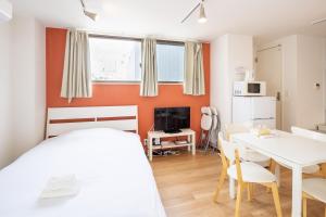 Μια τηλεόραση ή/και κέντρο ψυχαγωγίας στο 難波民泊