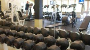 a bunch of dumbbells on display in a gym at Pico D305 in Killington