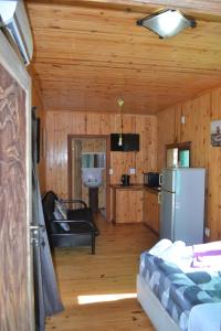 Η κουζίνα ή μικρή κουζίνα στο Onda Azul Family Unit