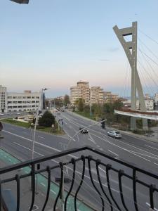 a view from a balcony of a highway with a bridge at Nova Central Apartment in Bacău