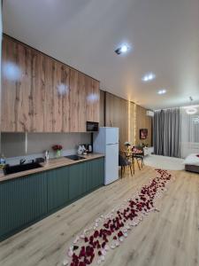 Kuchyň nebo kuchyňský kout v ubytování Romantic Studio For Couples