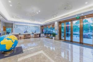 Vstupní hala nebo recepce v ubytování Kyriad Marvelous Hotel Yiyang Xiufeng Park