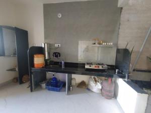 Kuchyň nebo kuchyňský kout v ubytování Todkars Villa