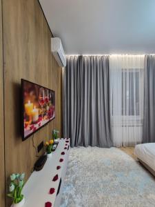 Postel nebo postele na pokoji v ubytování Romantic Studio For Couples