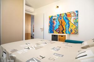 Postel nebo postele na pokoji v ubytování Le Lys du Lagon T4 - Escale entre mer et jardin privé